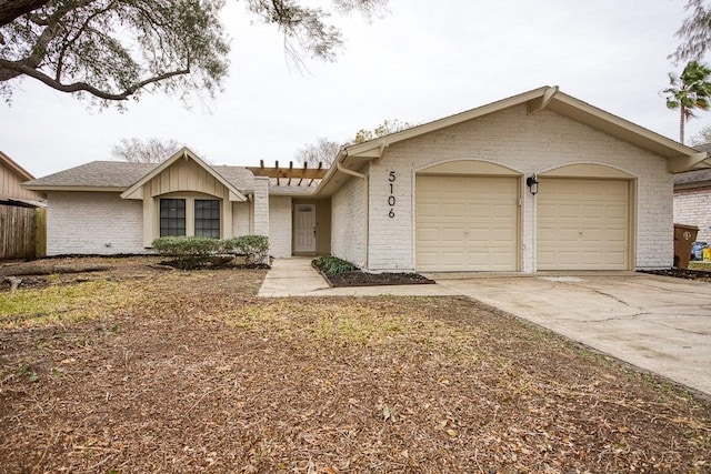 ranch-style house featuring a garage