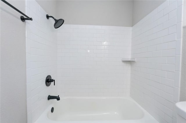 bathroom with shower / bathtub combination