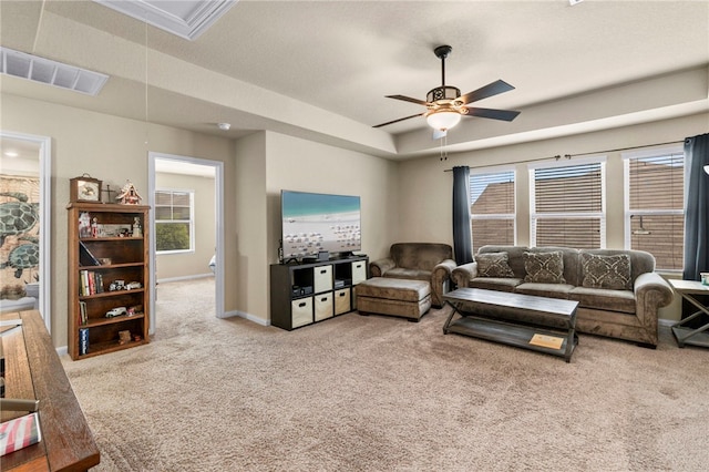 10343 Rosalina Loop, Converse, TX 78109 - carpeted living area featuring a ceiling fan and attic access
