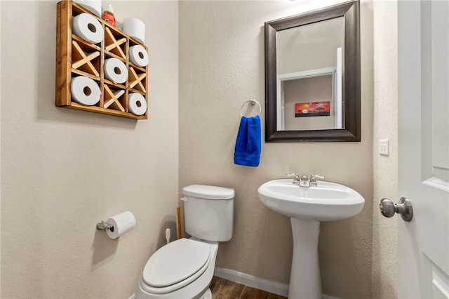 10343 Rosalina Loop, Converse, TX 78109 - bathroom with toilet and wood finished floors