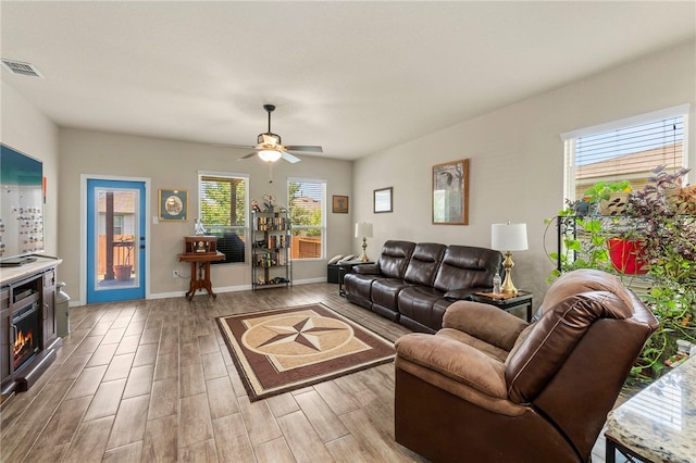 10343 Rosalina Loop, Converse, TX 78109 - living area with wood finished floors and ceiling fan