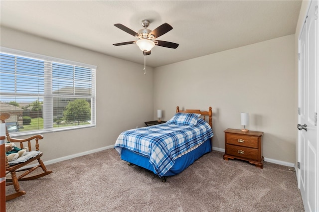 10343 Rosalina Loop, Converse, TX 78109 - carpeted bedroom with baseboards and ceiling fan