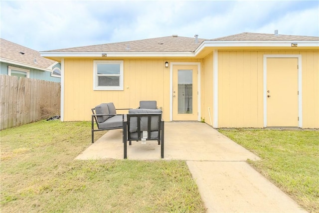back of property featuring a patio