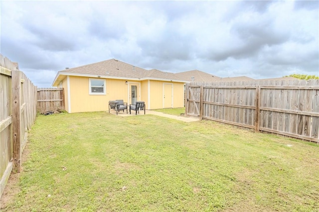 view of yard with a patio area