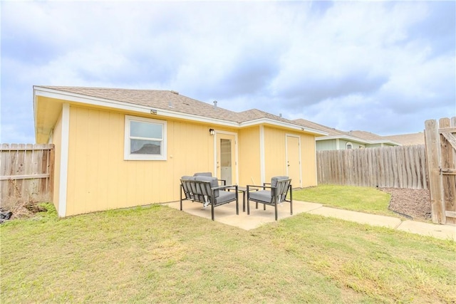 back of property featuring a patio area