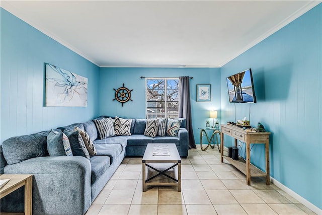 living area with baseboards, ornamental molding, and light tile patterned flooring