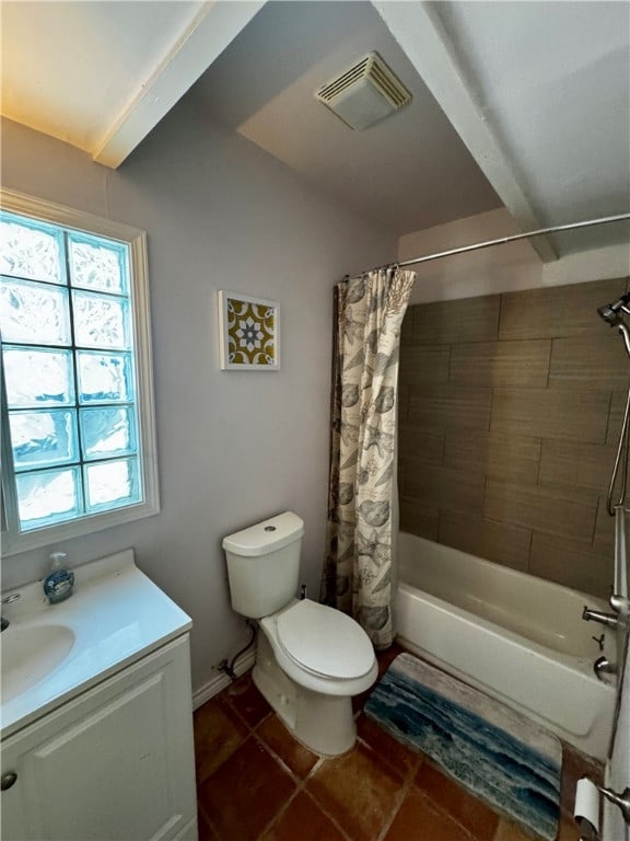 full bathroom featuring tile patterned flooring, vanity, toilet, and shower / bathtub combination with curtain