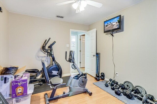 14970 Topgallant St, Corpus Christi, TX 78418 - exercise room with ceiling fan, wood finished floors, and baseboards