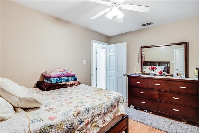 14970 Topgallant St, Corpus Christi, TX 78418 - bedroom with light wood-style floors and ceiling fan