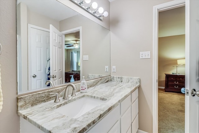14970 Topgallant St, Corpus Christi, TX 78418 - bathroom featuring vanity, a ceiling fan, and baseboards