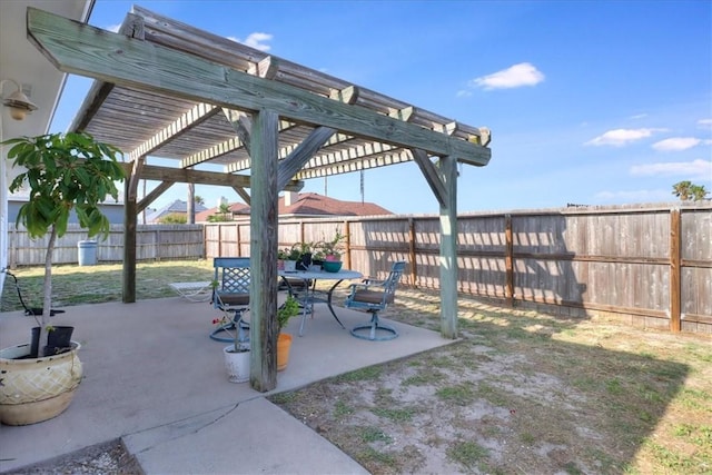 14970 Topgallant St, Corpus Christi, TX 78418 - fenced backyard featuring a pergola, a patio area, and outdoor dining area
