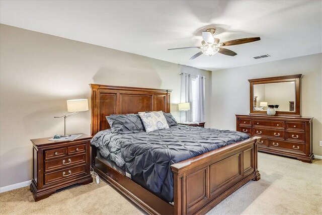 14970 Topgallant St, Corpus Christi, TX 78418 - bedroom with light colored carpet, baseboards, and ceiling fan