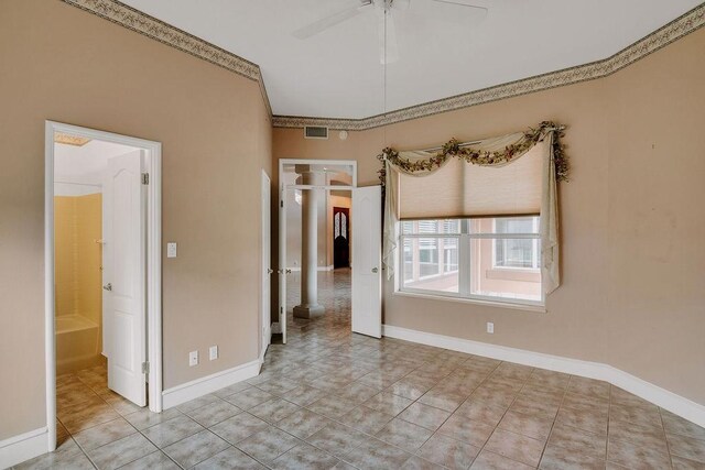 4950 Deer Park, Corpus Christi, TX 78413 - tiled empty room with ceiling fan and ornamental molding