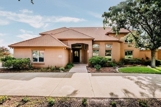 4950 Deer Park, Corpus Christi, TX 78413 - mediterranean / spanish-style home featuring stucco siding and a tile roof