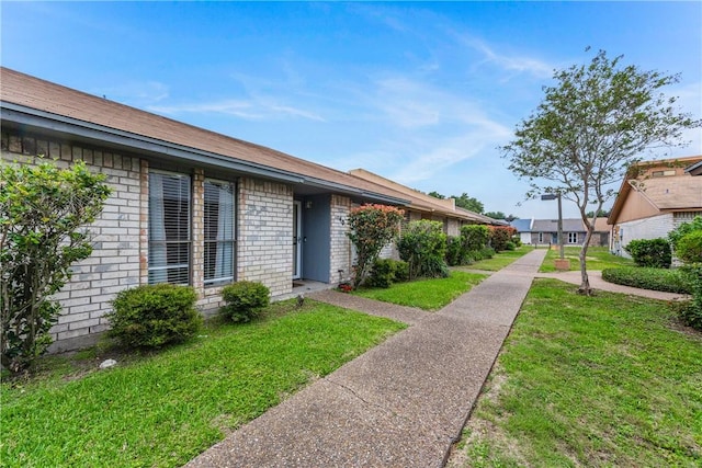 exterior space with a lawn