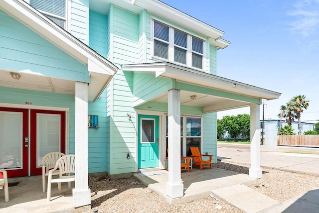 2120 S 11th St Unit 404, Port Aransas, TX 78373 - doorway to property with a porch
