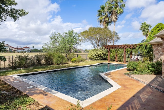 view of swimming pool featuring a patio and a pergola