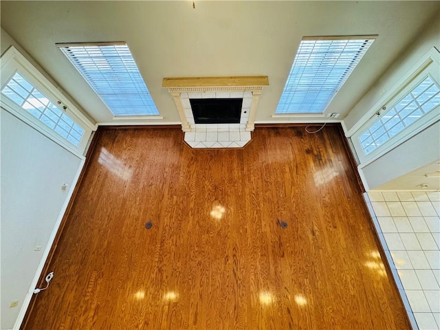 6242 Strasbourg Dr, Corpus Christi, TX 78414 - unfurnished living room with wood finished floors and healthy amount of natural light