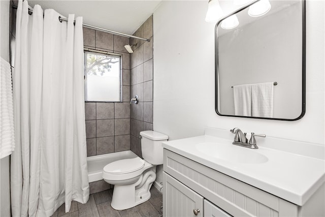 bathroom with hardwood / wood-style floors, vanity, toilet, and a shower with curtain