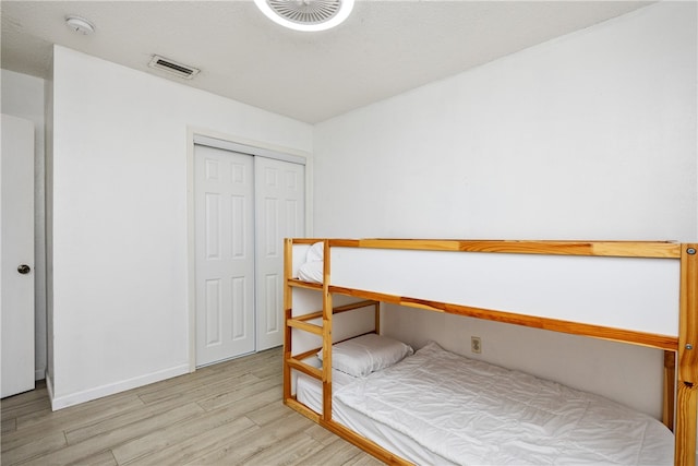 unfurnished bedroom featuring light hardwood / wood-style floors