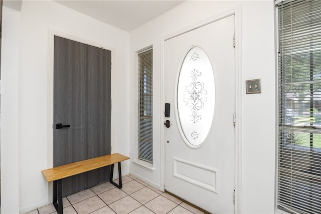 view of tiled foyer entrance