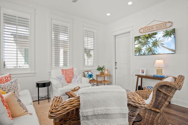 sitting room with recessed lighting, wood finished floors, and baseboards