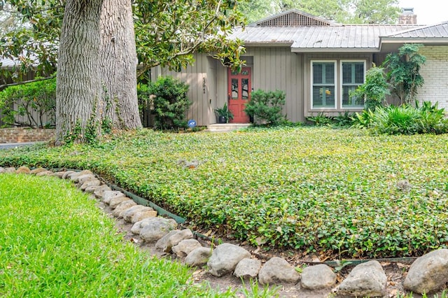 161 Red Bird Rdg, Beeville, TX 78102 - view of green lawn with french doors
