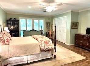 161 Red Bird Rdg, Beeville, TX 78102 - bedroom with ornamental molding, wood finished floors, and baseboards
