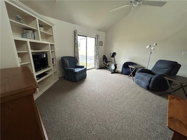 living area with lofted ceiling, carpet flooring, and ceiling fan