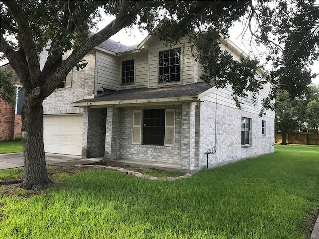 5026 Graford Pl, Corpus Christi, TX 78413 - traditional-style home with a front lawn, driveway, a garage, brick siding, and a shingled roof