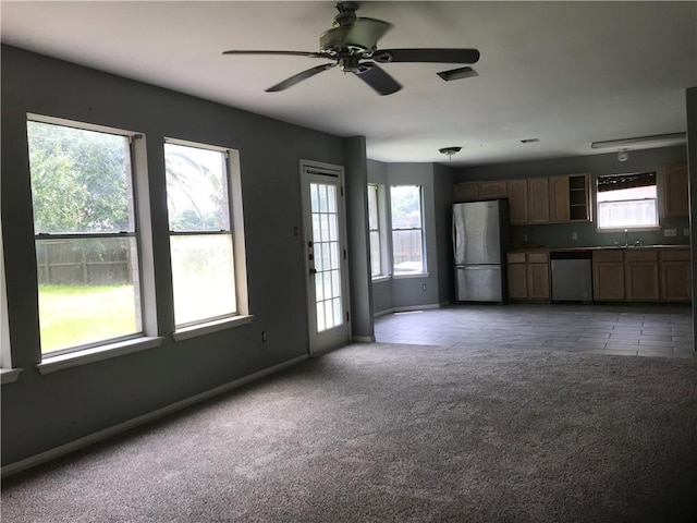 5026 Graford Pl, Corpus Christi, TX 78413 - unfurnished living room with ceiling fan and light carpet