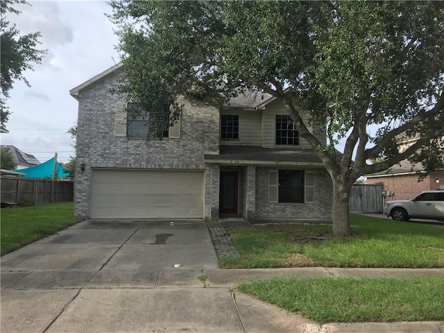 5026 Graford Pl, Corpus Christi, TX 78413 - traditional home with an attached garage, concrete driveway, and brick siding