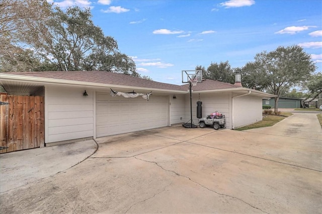 view of side of property with a garage