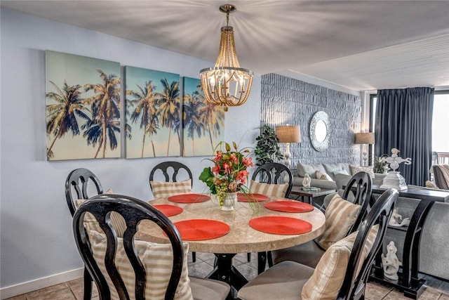 dining space featuring light tile patterned flooring and an inviting chandelier