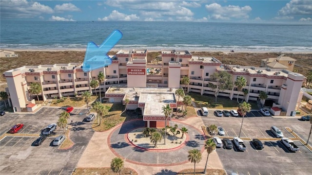 aerial view with a view of the beach and a water view