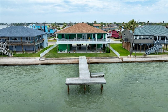 108 Bayshore Drive, Ingleside On The Bay, TX 78362 - dock area with stairs, a deck with water view, and a yard