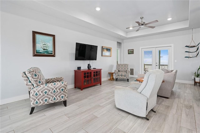 108 Bayshore Drive, Ingleside On The Bay, TX 78362 - living area featuring a raised ceiling, ceiling fan, baseboards, light wood-type flooring, and recessed lighting