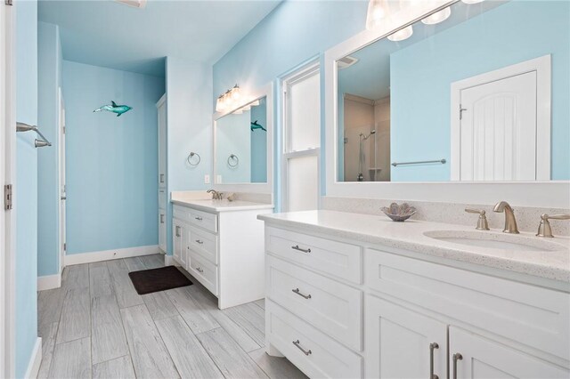 108 Bayshore Drive, Ingleside On The Bay, TX 78362 - bathroom with an enclosed shower and two vanities
