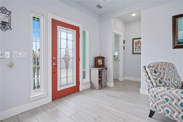 108 Bayshore Drive, Ingleside On The Bay, TX 78362 - entryway with baseboards and light wood-type flooring