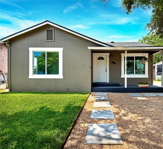 1437 14th St, Corpus Christi, TX 78404 - ranch-style home featuring a front lawn and a porch