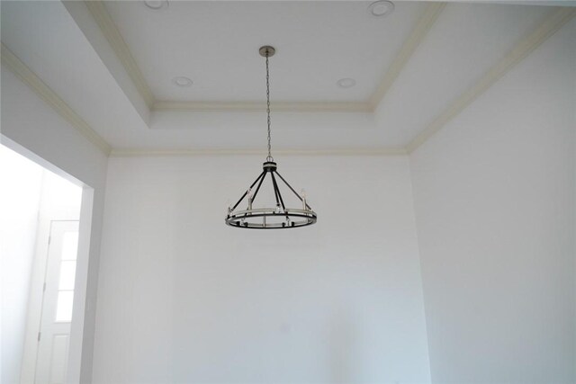 3525 Sahar Lk, Corpus Christi, TX 78380 - room details with a notable chandelier, ornamental molding, and a raised ceiling