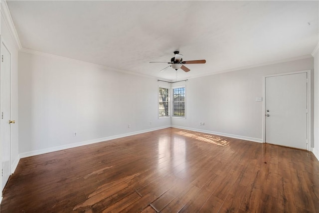 empty room featuring ceiling fan, dark hardwood / wood-style flooring, and ornamental molding