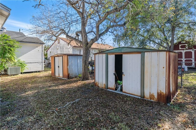 view of outdoor structure with central AC