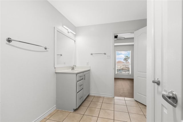 13901 Mingo Cay Ct Unit F, Corpus Christi, TX 78418 - bathroom featuring tile patterned floors, baseboards, a ceiling fan, and vanity