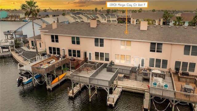 13901 Mingo Cay Ct Unit F, Corpus Christi, TX 78418 - dock with a residential view and a deck with water view