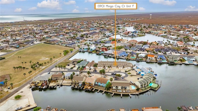 13901 Mingo Cay Ct Unit F, Corpus Christi, TX 78418 - aerial perspective of suburban area with a nearby body of water