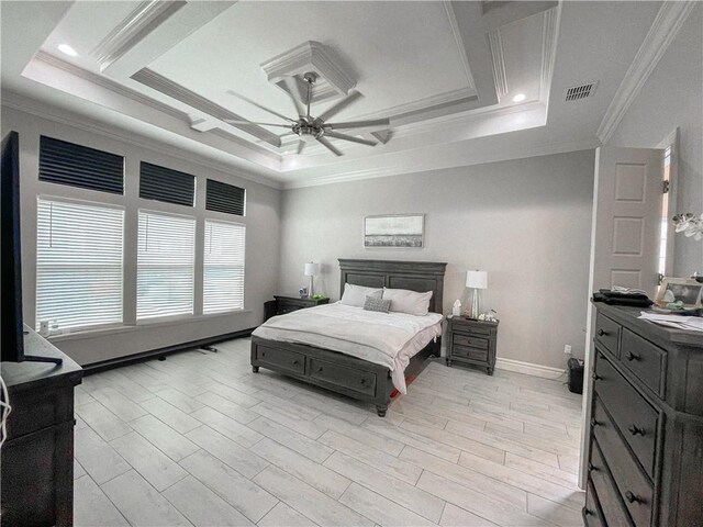 8137 Berenstain Dr, Corpus Christi, TX 78414 - bedroom with a tray ceiling, crown molding, ceiling fan, and baseboards