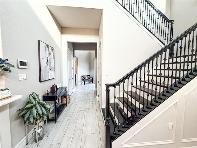 8137 Berenstain Dr, Corpus Christi, TX 78414 - staircase featuring baseboards and wood finished floors