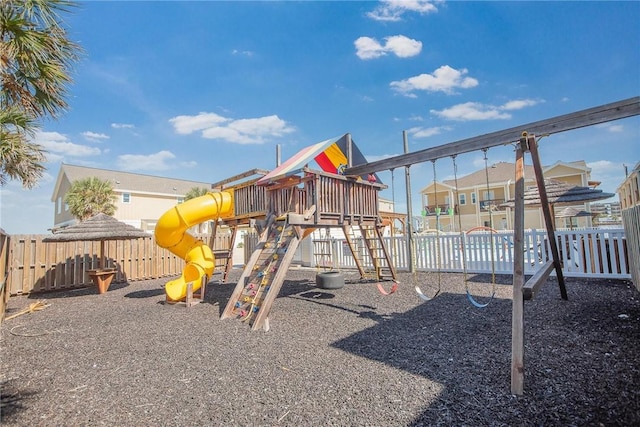 view of jungle gym with fence