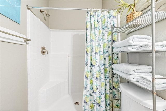 bathroom with a stall shower